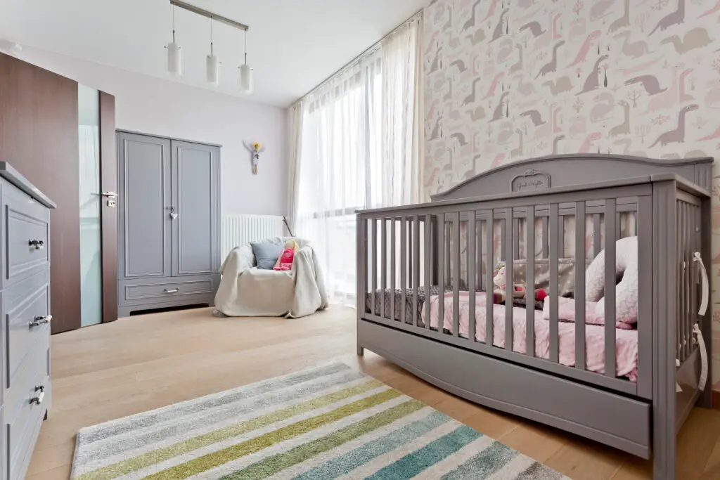 Nursery with wooden grey cradle- setting up a safe sleep environment